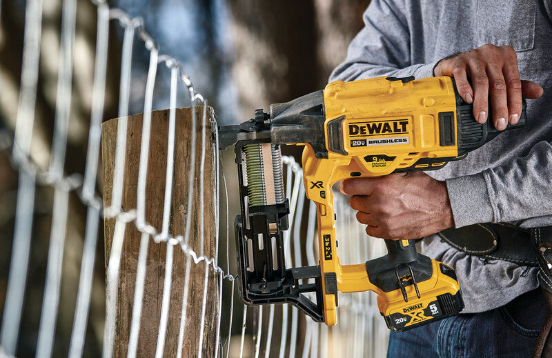 Cordless DEWALT 9GA fence stapler with 20V battery, designed for fast and efficient rural fencing applications