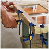 Set of four 6-inch quick grip clamps with anti-mark pads and one-handed trigger release for secure woodwork holding