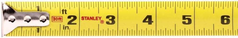 Stanley 30-foot measuring tape with high-strength ABS case and polymer-coated blade resisting abrasion and clear markings