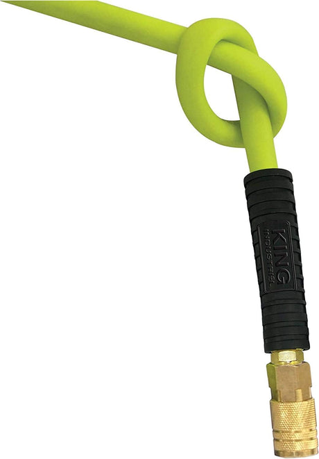 Yellow polymer hybrid air hose with black protective sleeve and brass coupling for industrial air tool use