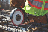 Cutting metal rebar with handheld power saw equipped with LENOX Metal Max cutting blade generating sparks