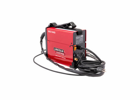 Compact red Lincoln Electric MIG welder with wire feeding, cooling fan, and attached power and welding cables