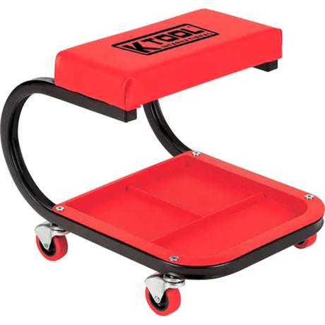 Red mechanic’s creeper seat with padded cushion, steel frame, divided tray, and swivel caster wheels for workshop use