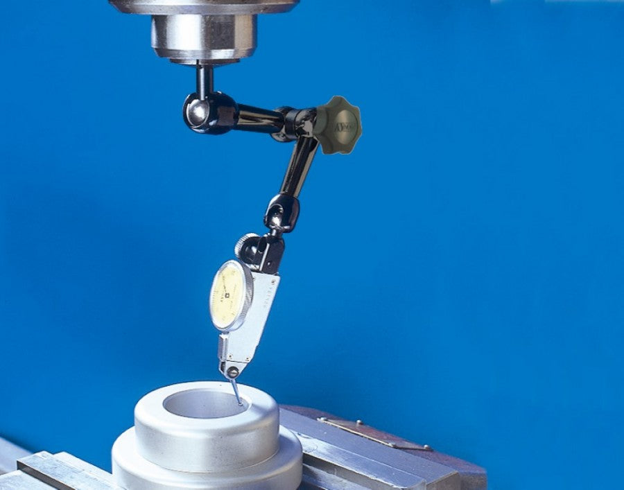 Precision centering tool with adjustable black arm and spring-loaded locking mechanism for accurate part alignment