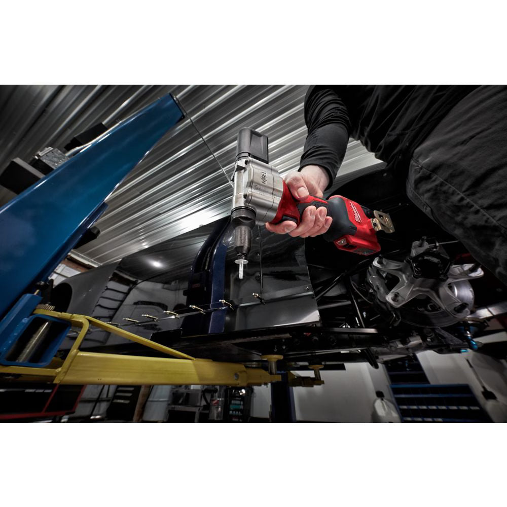 Cordless Milwaukee M12 12V lithium-ion rivet tool used for fast, durable 3/16-inch rivet installation in automotive repair