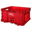 Red Milwaukee PACKOUT open storage box with reinforced polymer construction and integrated handles for modular storage systems