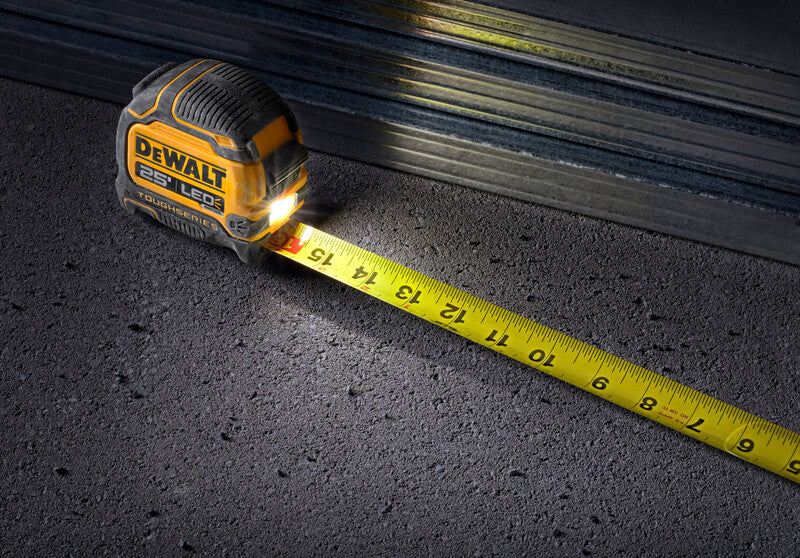 25-foot DEWALT measuring tape with integrated LED light and durable yellow blade for enhanced visibility and precision measurement