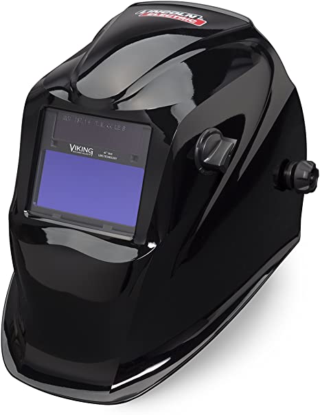 Glossy black Lincoln welding helmet with auto-darkening visor and adjustable side control knob for eye protection.