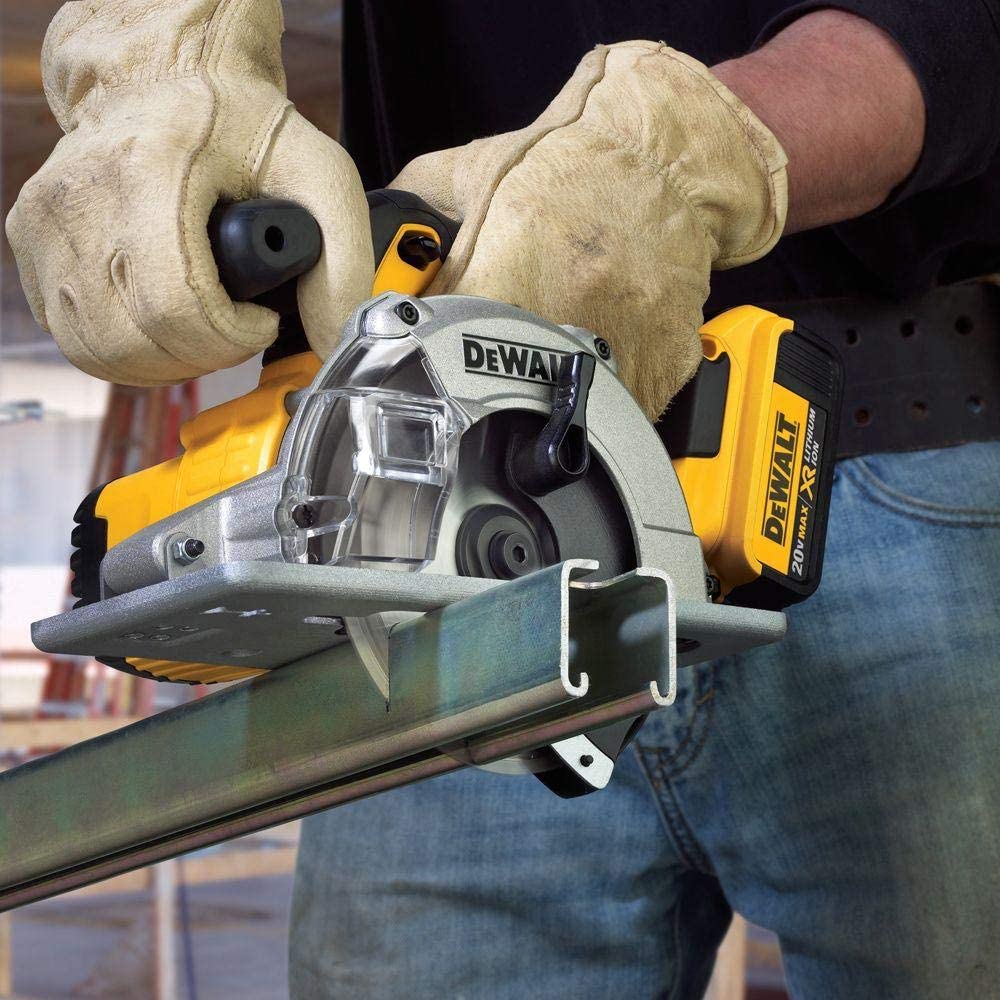 Cordless metal cutting circular saw with high-strength steel base and comfortable grip, showing cutting action on metal piece