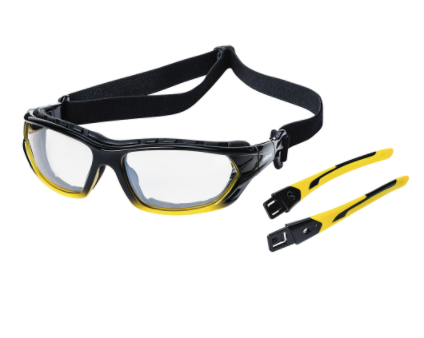 Sealed safety goggles with foam seal, clear tinted lenses, adjustable black strap, and yellow detachable temples for dust protection