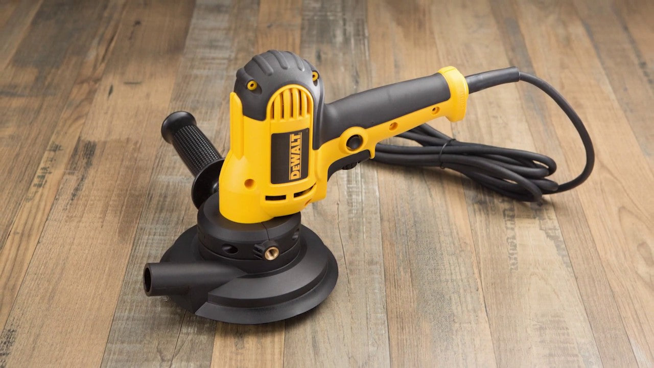 Yellow and black Dewalt corded polisher with 6 A motor, ergonomic handle, and adjustable speed trigger dial for heavy-duty sanding tasks