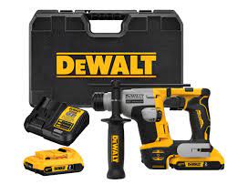 Cordless SDS Plus rotary hammer drill kit with brushless motor, auxiliary handle, battery, and charger in hard case